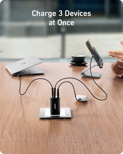 Two Anker 735 Nano II 65W chargers for fast charging devices, shown in sleek black design.
