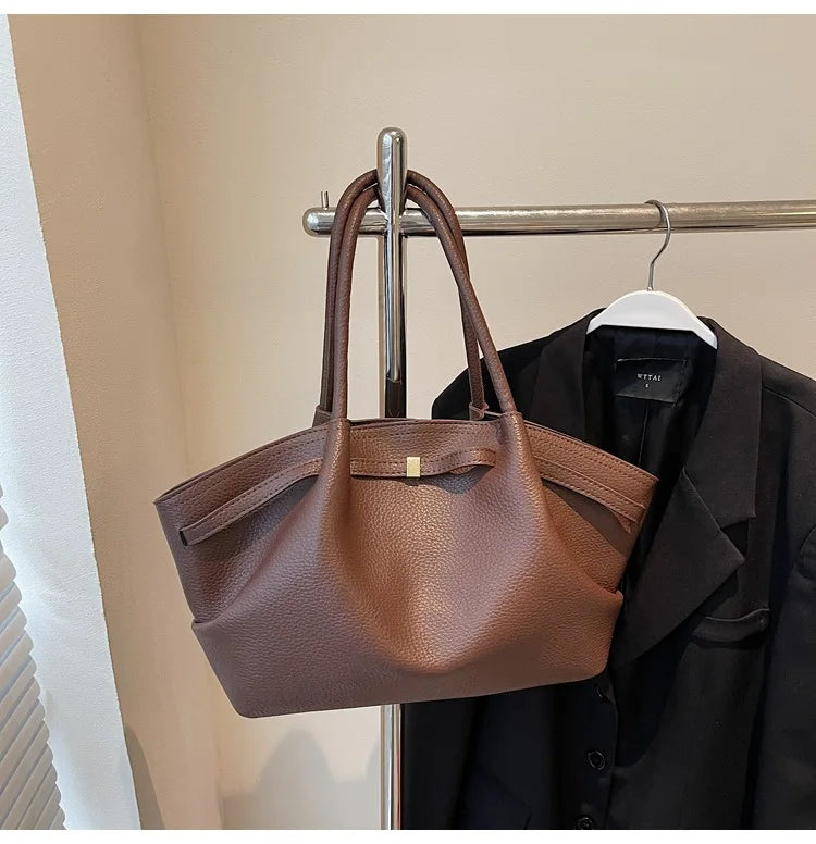 Luxury soft PU leather tote bag by Worldfone Direct Store, spacious women's crossbody bag for commuting and travel.