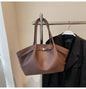 Luxury soft PU leather tote bag by Worldfone Direct Store, spacious women's crossbody bag for commuting and travel.