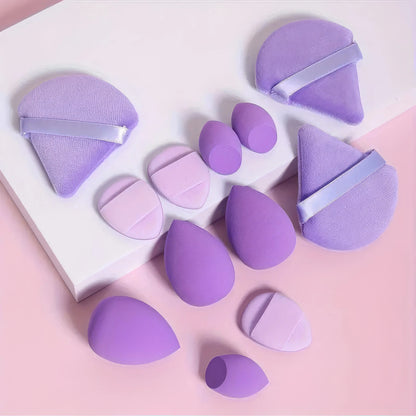Set of 12 purple latex-free makeup sponges for blending foundation, displayed in a neat arrangement on a clean surface.
