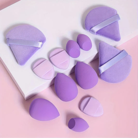 Set of 12 purple latex-free makeup sponges for blending foundation, displayed in a neat arrangement on a clean surface.