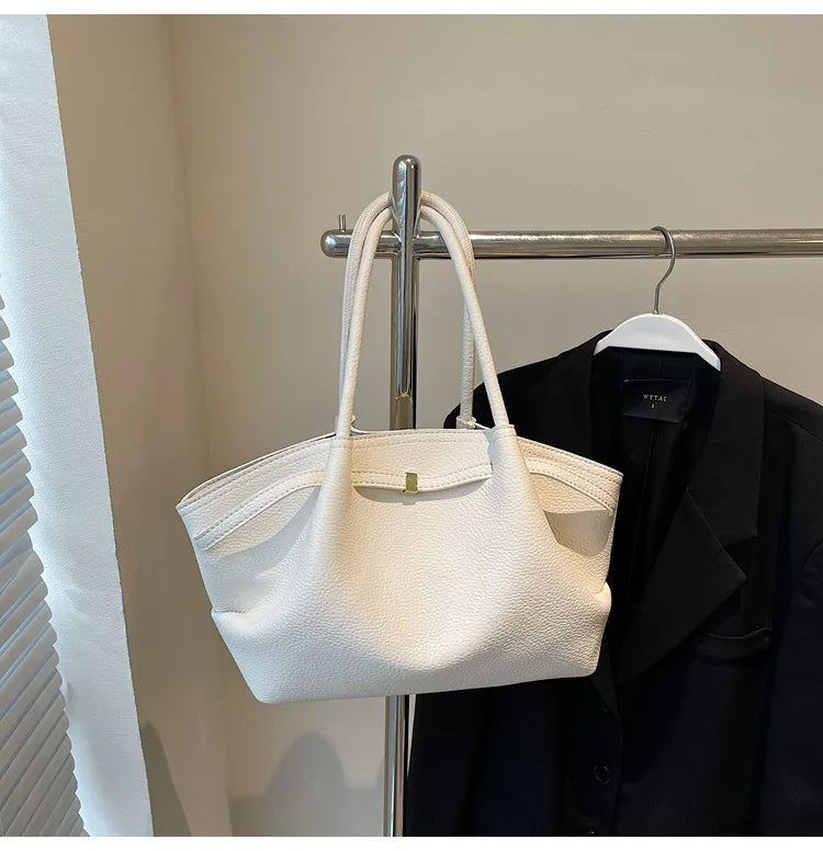 Luxury soft PU leather tote bag by Worldfone Direct Store, spacious women's crossbody bag for commuting and travel, stylish design.