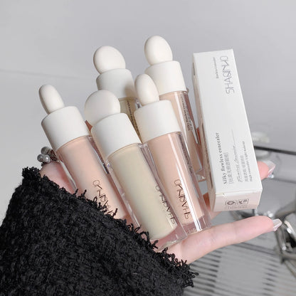 Blushimmer Flawless Finish Liquid Concealer for blemishes, dark circles, and freckles with smooth, long-lasting coverage.