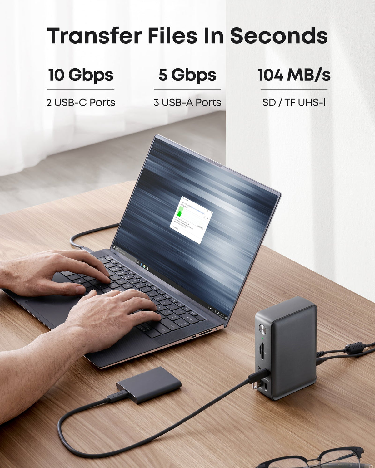 Anker 575 USB-C Docking Station for charging, featuring multiple ports, compact design, and sleek black finish.