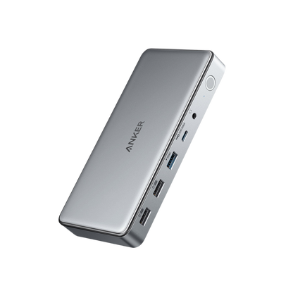 Anker 563 USB-C Docking Station 10-in-1 with multiple ports for charging and connectivity, shown connected to a laptop.