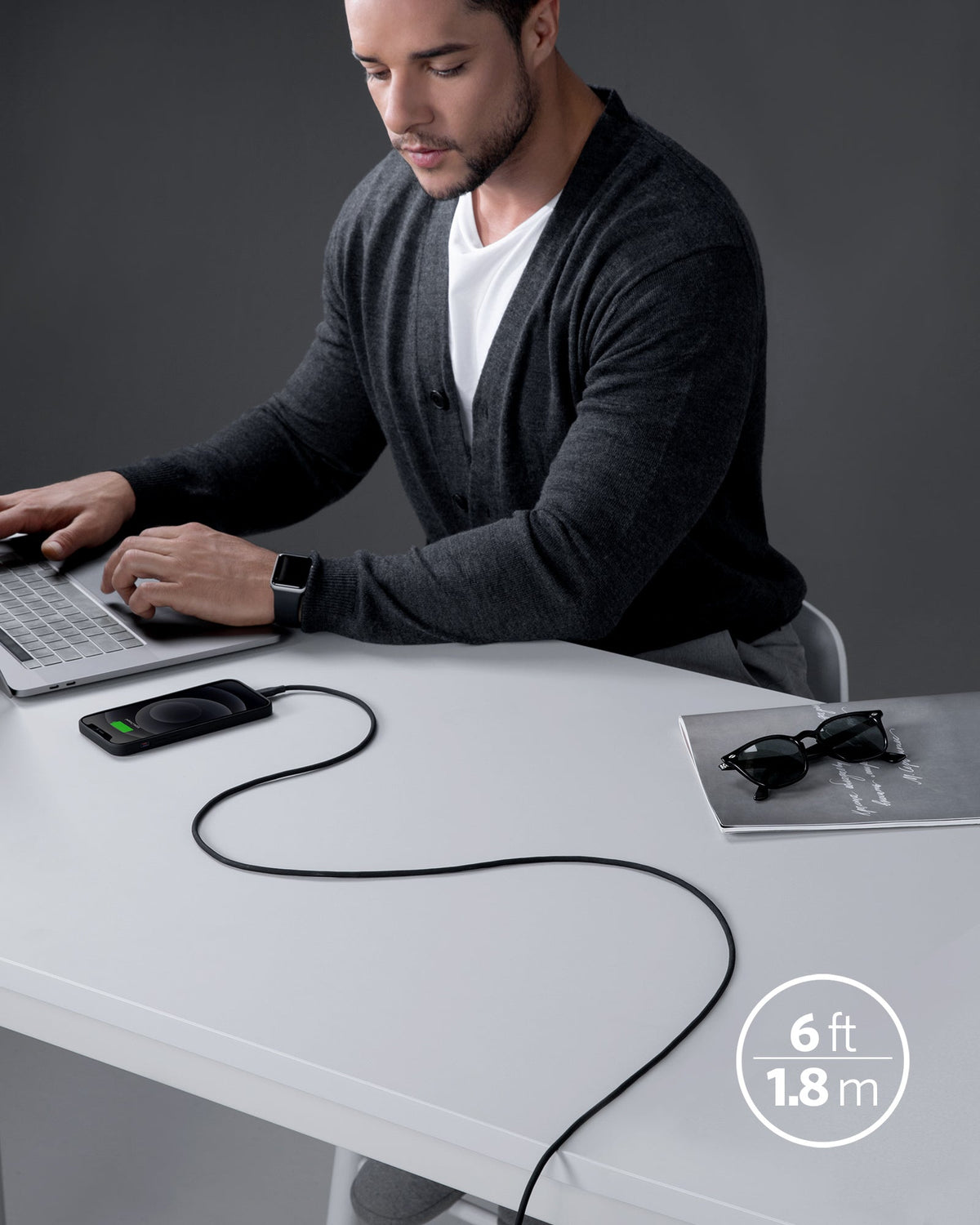 Anker 641 USB-C to Lightning Cable, 3 ft silicone charging cable with Flow design, shown in black with connectors visible.