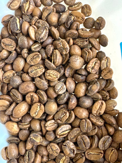 Roasted organic Peru Aromas del Valle Merly Leon G1 coffee beans by Good Brothers Coffee LLC.
