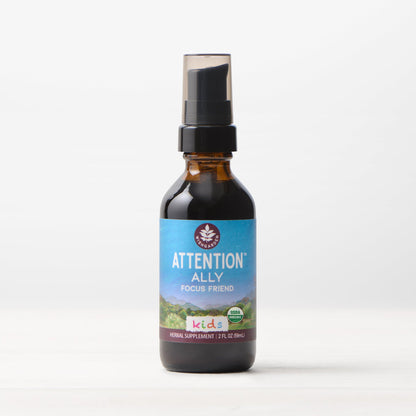 Kids taking Attention Ally, WishGarden Herbs focus supplement, with colorful packaging and natural ingredients in the background.