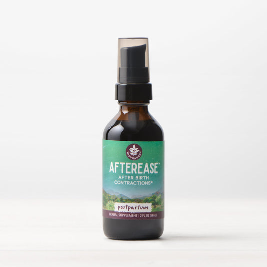 Postpartum AfterEase by WishGarden Herbs, herbal supplement for easing after birth contractions, shown in a natural setting.