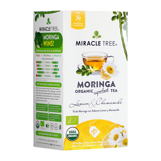 Organic Moringa Tea with lemon and chamomile by Miracle Tree, featuring herbal tea bags with fresh lemon slices and chamomile flowers.