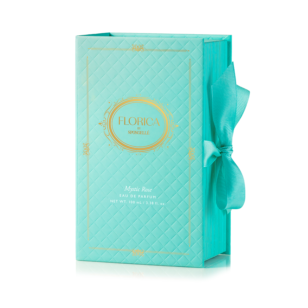 Mystic Rose Eau de Parfum by Spongellé, a floral body fragrance with a sleek bottle and elegant rose design.