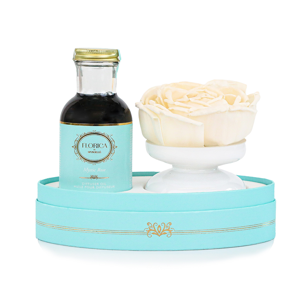 Spongellé Mystic Rose Floret Diffuser in a glass bottle with delicate flower accents, designed for home fragrance.
