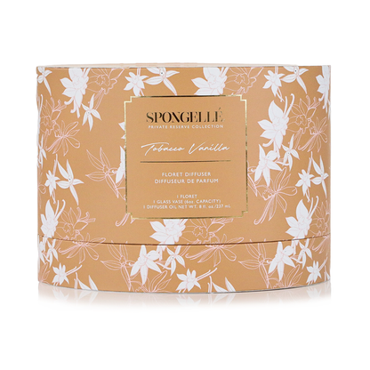 Private Reserve Tobacco Vanilla home fragrance diffuser by Spongellé with sleek glass bottle and reed sticks for aromatic scent diffusion.