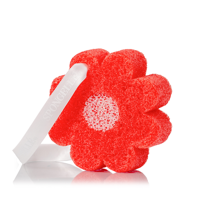Hawaiian Pua Kenikeni body wash infused buffer by Spongellé with floral design and textured surface for exfoliation.
