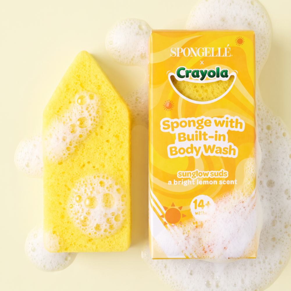 Spongellé Sunglow Suds Body Buffer infused with body wash, in vibrant yellow with textured surface, designed for gentle cleansing.