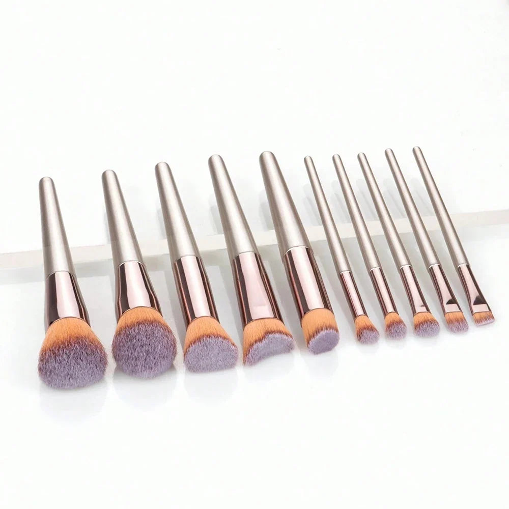 Blushimmer 14-piece synthetic makeup brush set with foundation, powder, concealer, eyeshadow, and blush brushes displayed on a white background.