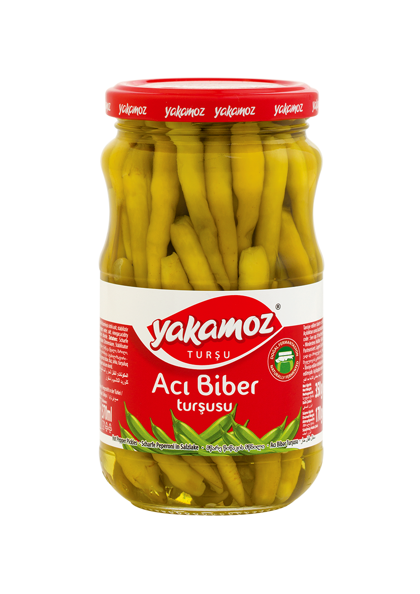 S101 Yakamoz hot pepper pickle in glass jar, spicy Turkish aci biber turşusu with vibrant red peppers and brine.