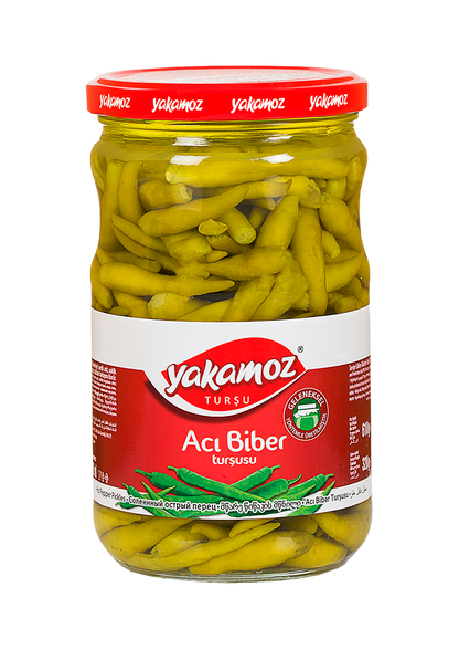 Glass jar of S101 Yakamoz Hot Pepper Pickle with vibrant red peppers inside, showcasing spicy Turkish-style hot pepper pickle.