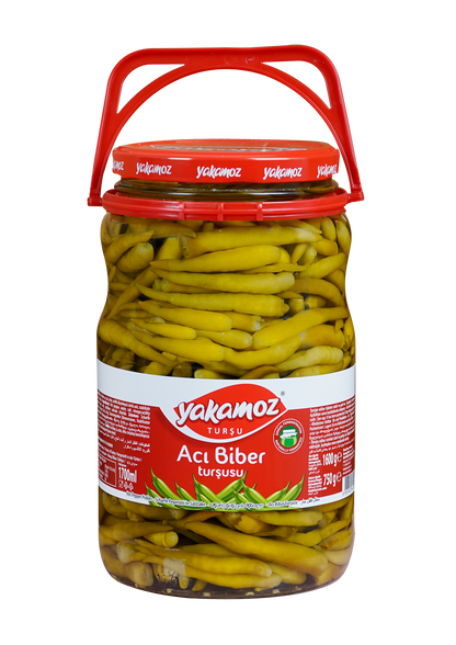 Glass jar of S101 Yakamoz hot pepper pickle with vibrant red peppers, showcasing the spicy, flavorful Turkish aci biber tursusu.