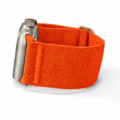 Orange Robust Active Stretch Band lying flat, showing its flexible, durable design for resistance training and muscle stretching.
