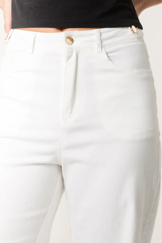 White wide-leg trousers by Aftershock London, displayed flat showing their relaxed fit and clean design.