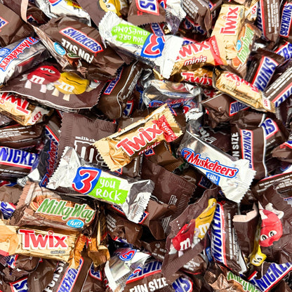 Assorted chocolate candies including Snickers, Twix, Milky Way, M&M's, and 3 Musketeers in a bulk Candy In Bulk bag.