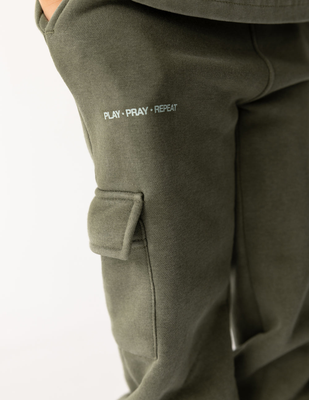 Kids cargo sweatpants by Elevated Faith with multiple pockets, in a comfortable, casual style for boys and girls.