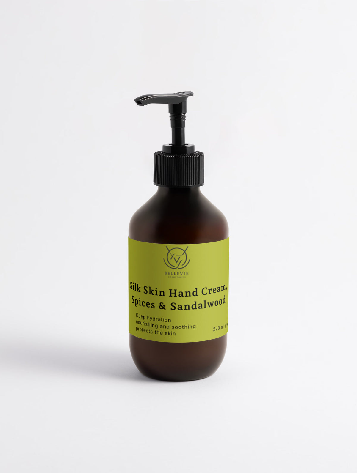 Amber glass pump bottle of BelleVie Silk Skin Hand Cream with lime green label, black pump, against a white background.