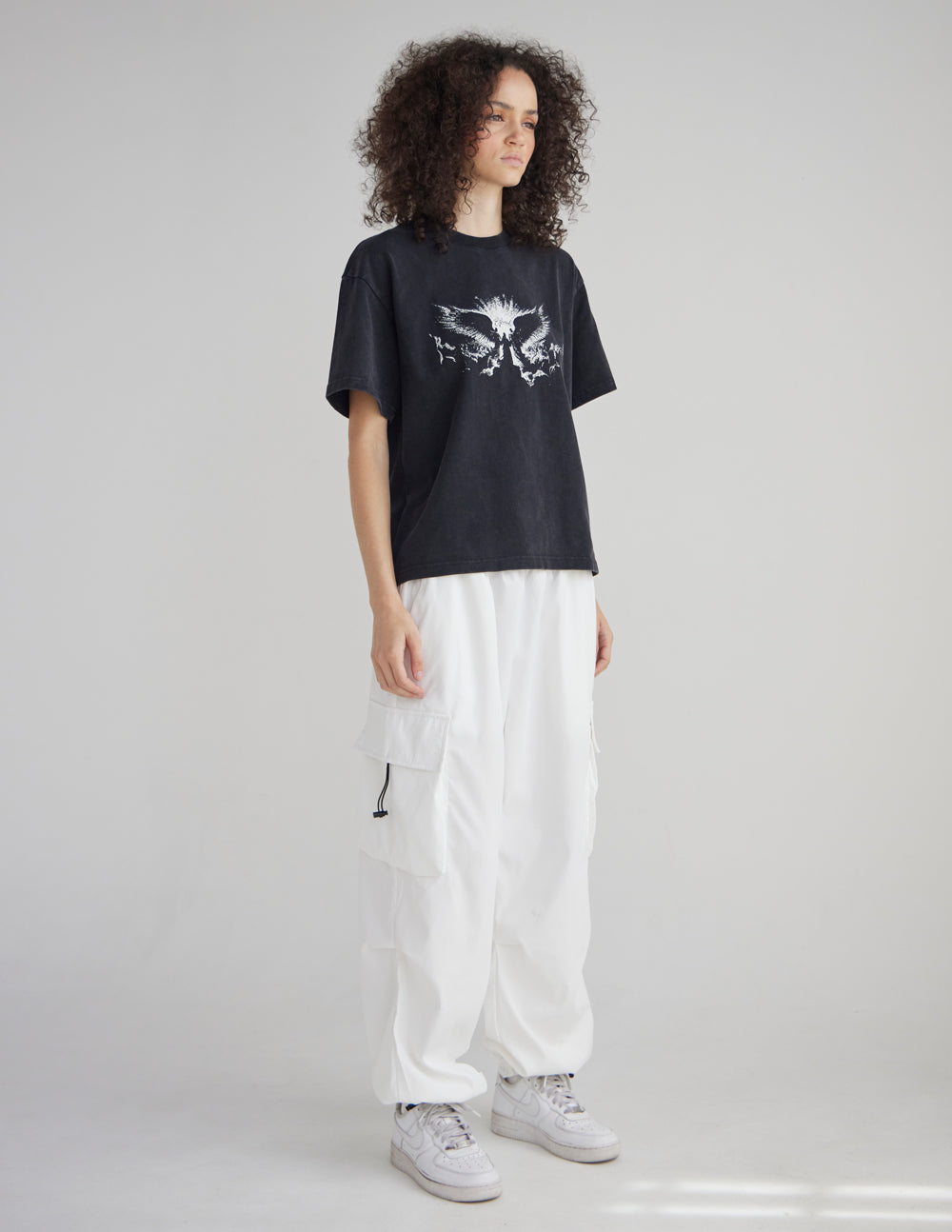 Elevated Faith Angels Heavyweight T-Shirt featuring a bold angel illustration on soft, durable fabric.