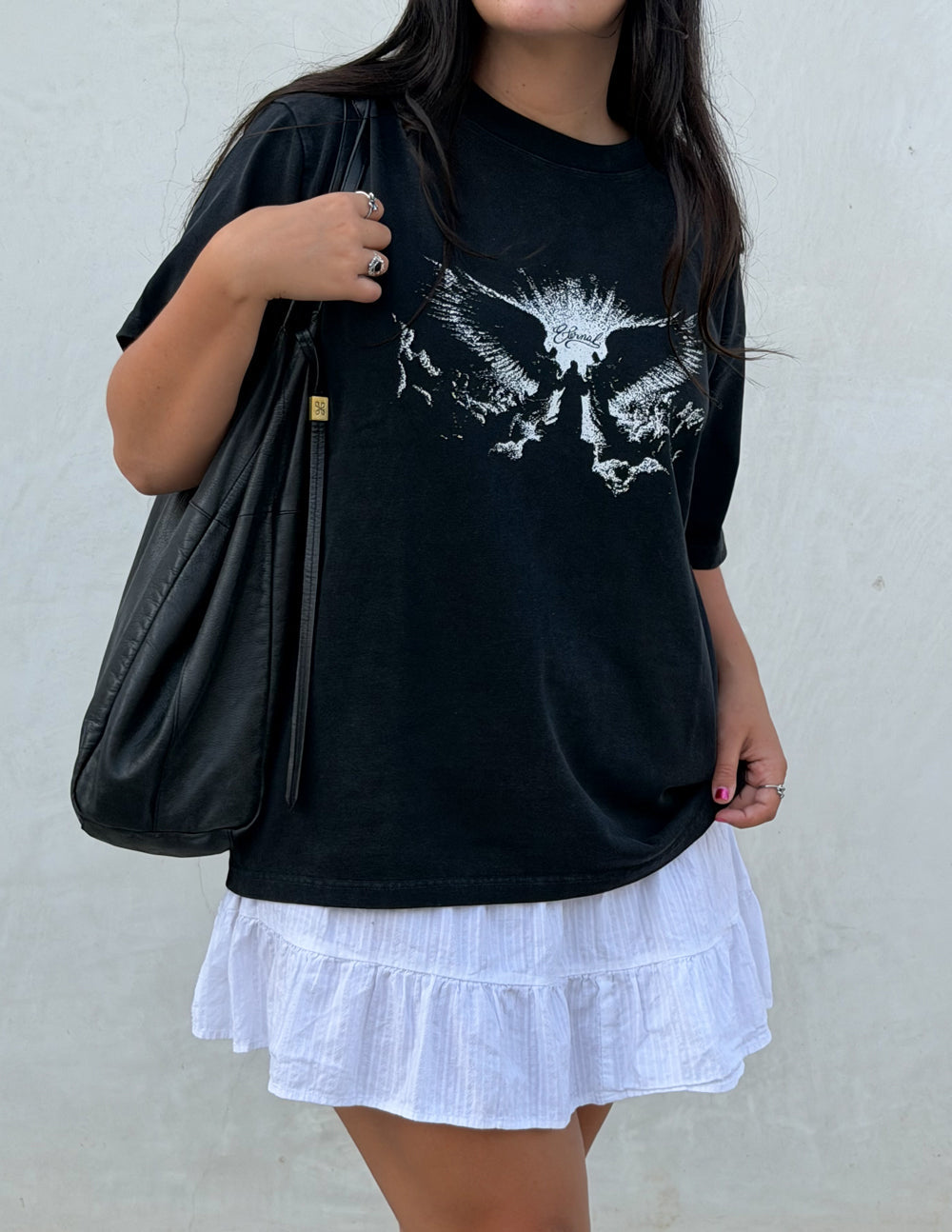 Elevated Faith Angels Heavyweight T-Shirt featuring a detailed angel graphic on soft, durable fabric in a casual fit.