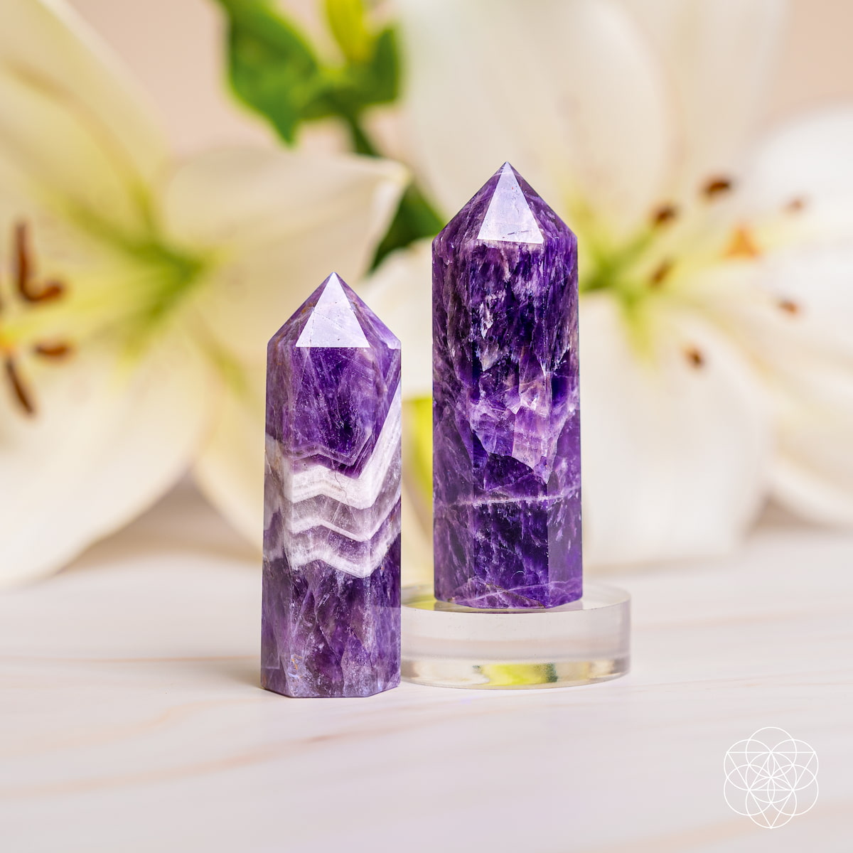 Chevron Amethyst Point of Transformation from Cycle Breaker by Conscious Items, a striking home decoration with purple and white banded quartz.