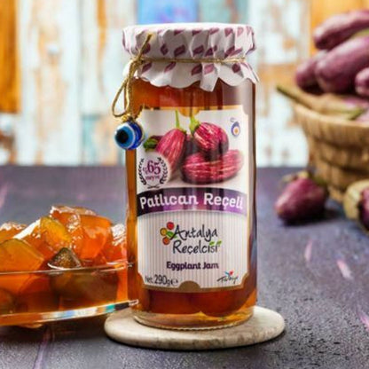 S101 Antalya Eggplant Jam in a 290g jar, showcasing the dark purple jam with a textured surface and a spoonful served on a plate.