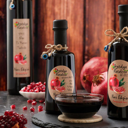 S101 Antalya Pomegranate Sour 500ml bottle, pantry item with bright red pomegranate flavor and clear liquid in a glass bottle.