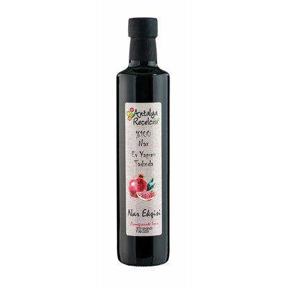 S101 Antalya Pomegranate Sour 500ml pantry bottle with vibrant pomegranate juice and sour flavor in a clear plastic container.
