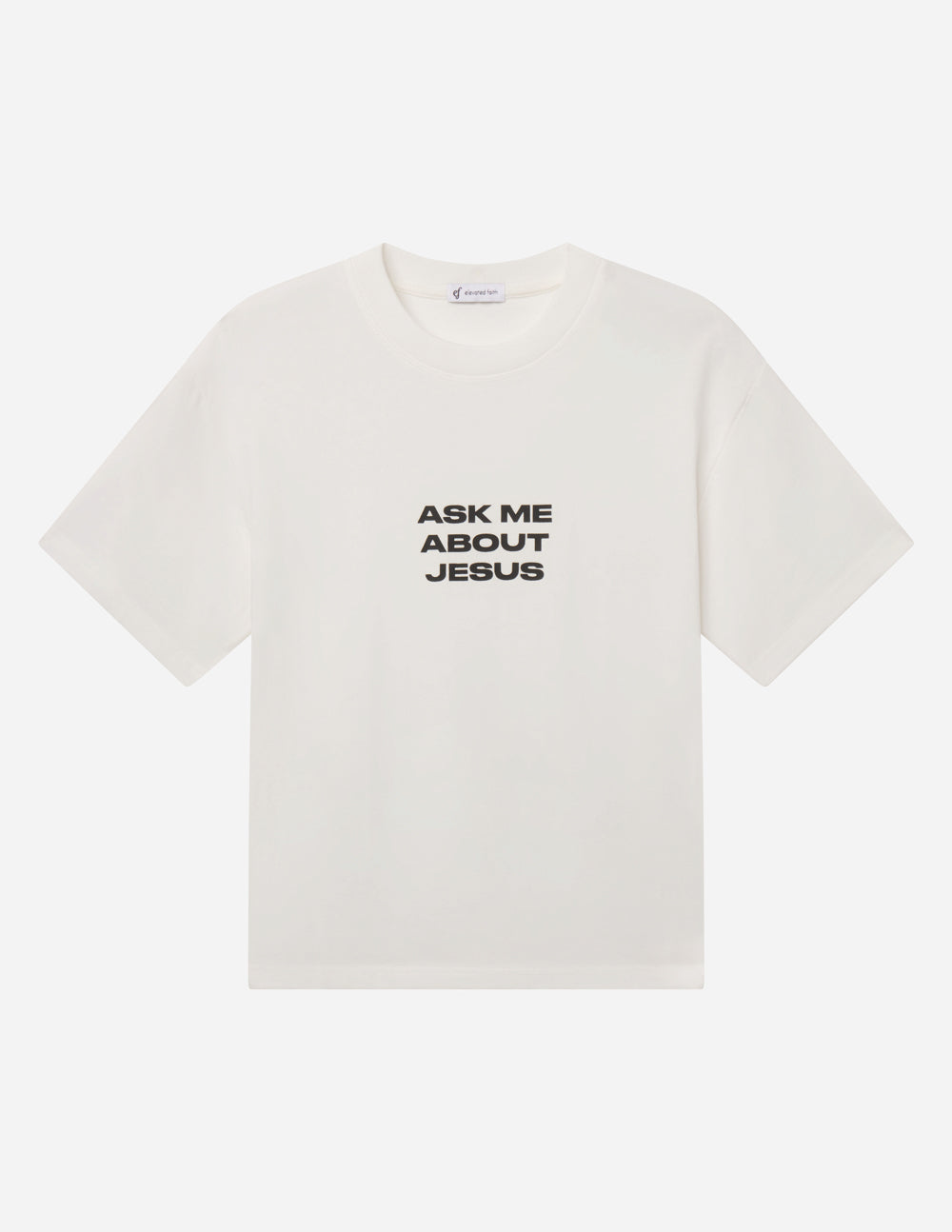 Elevated Faith Ask Me About Jesus heavyweight T-shirt featuring bold white text on a black fabric background.