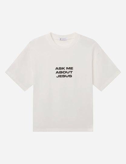 Elevated Faith Ask Me About Jesus heavyweight T-shirt featuring bold white text on a black fabric background.