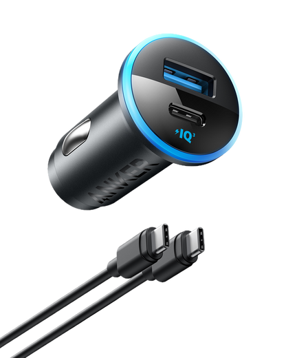 Anker 323 car charger with 52.5W power output connected to a vehicle's cigarette lighter socket.