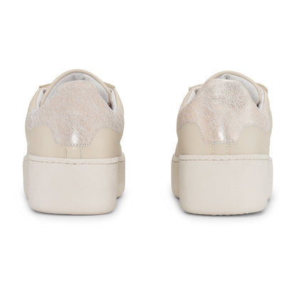 Beige ReyRey Special Edition sneakers with white soles and stylish design, shown from a side angle.