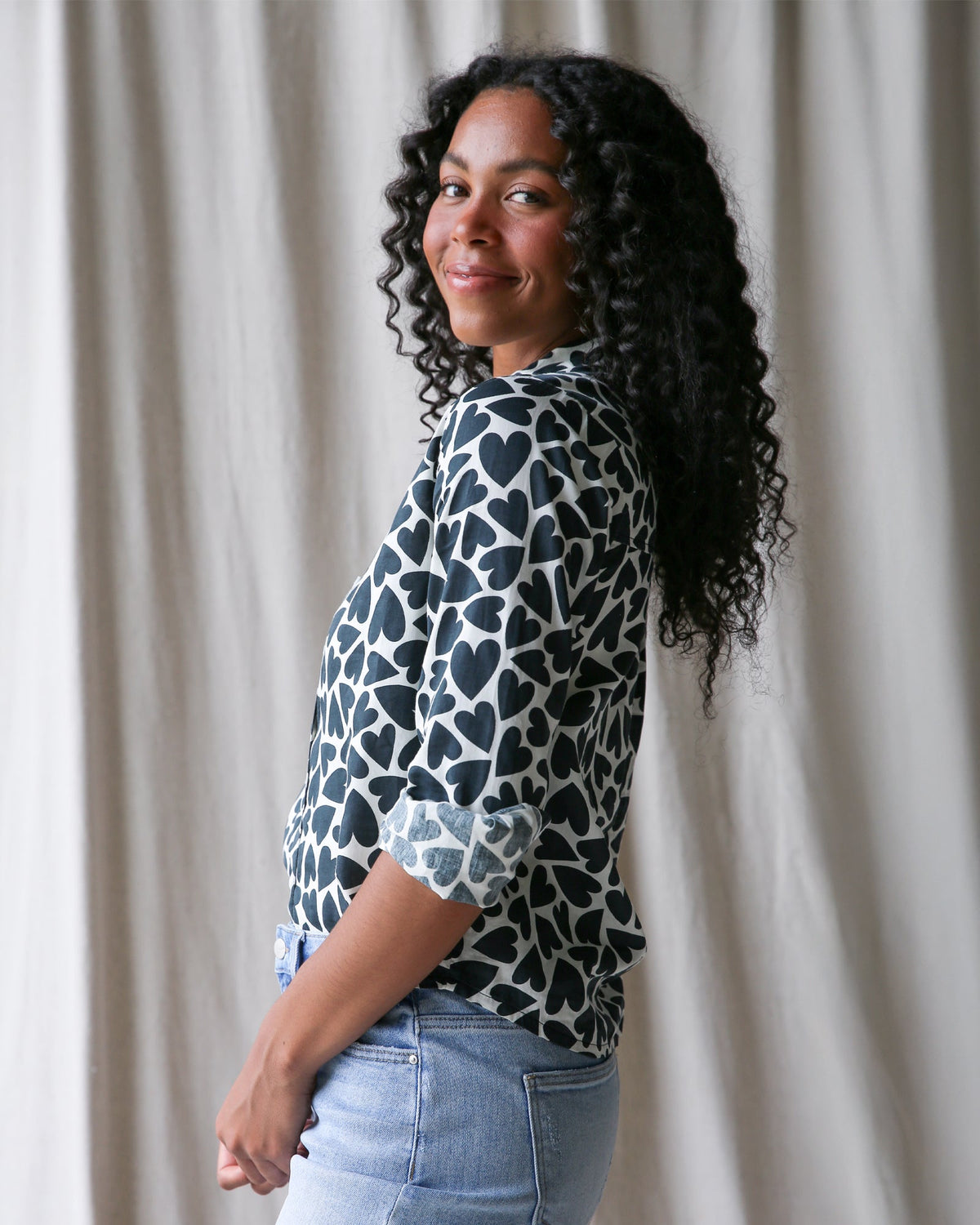 Downeast More Love Top showing a stylish women's sleeveless blouse with a relaxed fit and soft fabric.