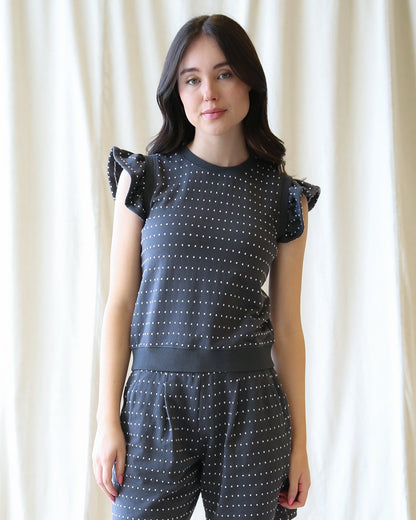 Downeast On Repeat Pullover, a cozy knit top in neutral color, displayed on a hanger against a plain background.