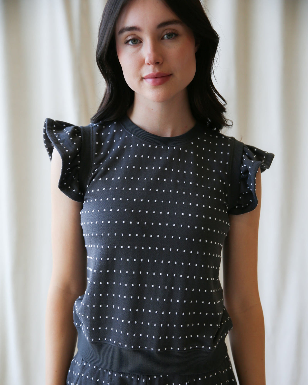 Downeast On Repeat Pullover, a stylish knit top with a relaxed fit, shown in a cozy, neutral-colored fabric.