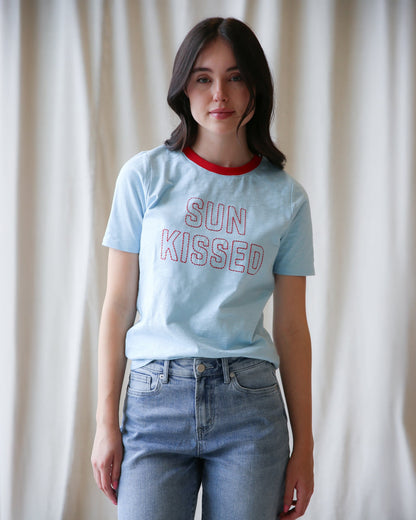 Sun Kissed Tee by Downeast, a casual tops featuring a relaxed fit and soft fabric, shown in a natural outdoor setting
