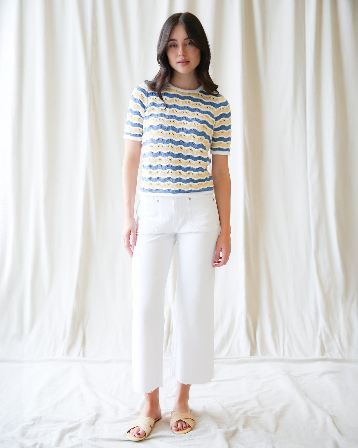Downeast High Tides sweater featuring a cozy knit design in ocean-inspired colors, perfect for casual wear.