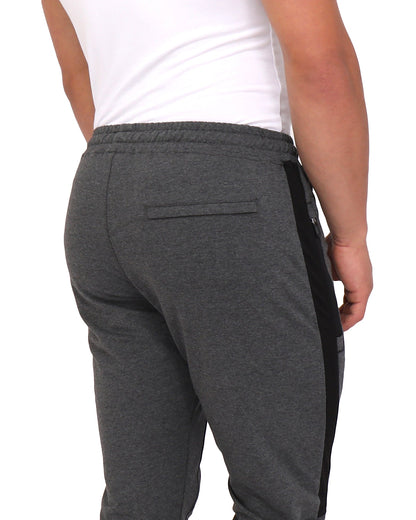 Back close-up of SCR Sportswear Infinite Flex Tall Fit men's joggers sweatpants showing fabric texture and seam details.