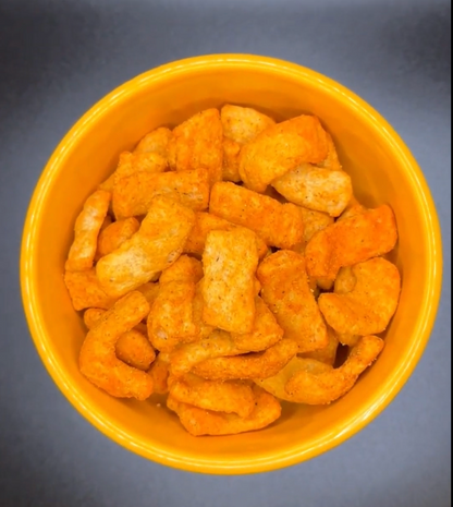 AmBari Nutrition Protidiet BBQ Crisps in a bowl, showcasing crispy, flavorful low-calorie snack chips with BBQ seasoning.