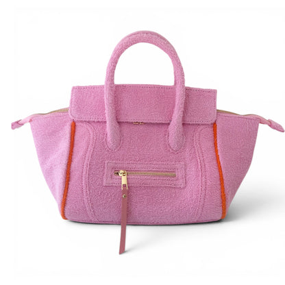 Beach Haus Cabana Tote Mini in Bubblegum pink, showing the compact tote bag with woven texture and colorful handles.