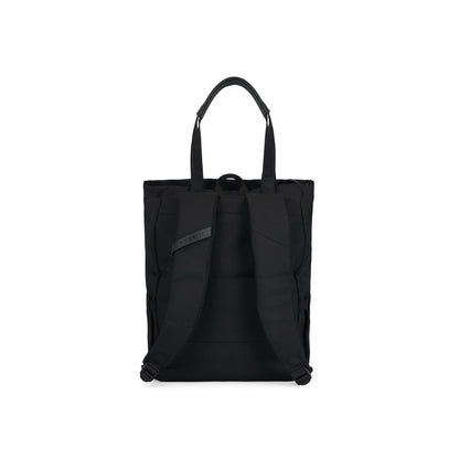 Black Madison Convertible Tote Bag by Bugatti Collections with adjustable straps and spacious interior, shown from the back.