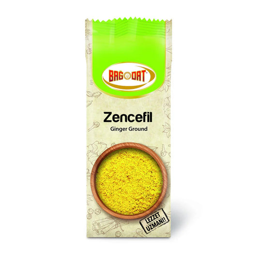 Ground ginger spice in a S101 Bagdat 60g packet, natural light highlighting the textured, finely ground ginger seasoning.