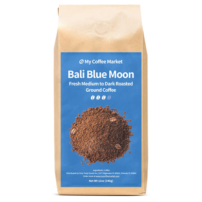 Bali Blue Moon medium to dark roast ground coffee in 12 oz package by My Coffee Market, showcasing the coffee grounds in a bag.