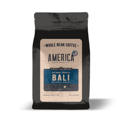 Whole Bali single origin coffee beans by America Supply Company LLC, showcasing fresh, roasted coffee beans in a natural setting.